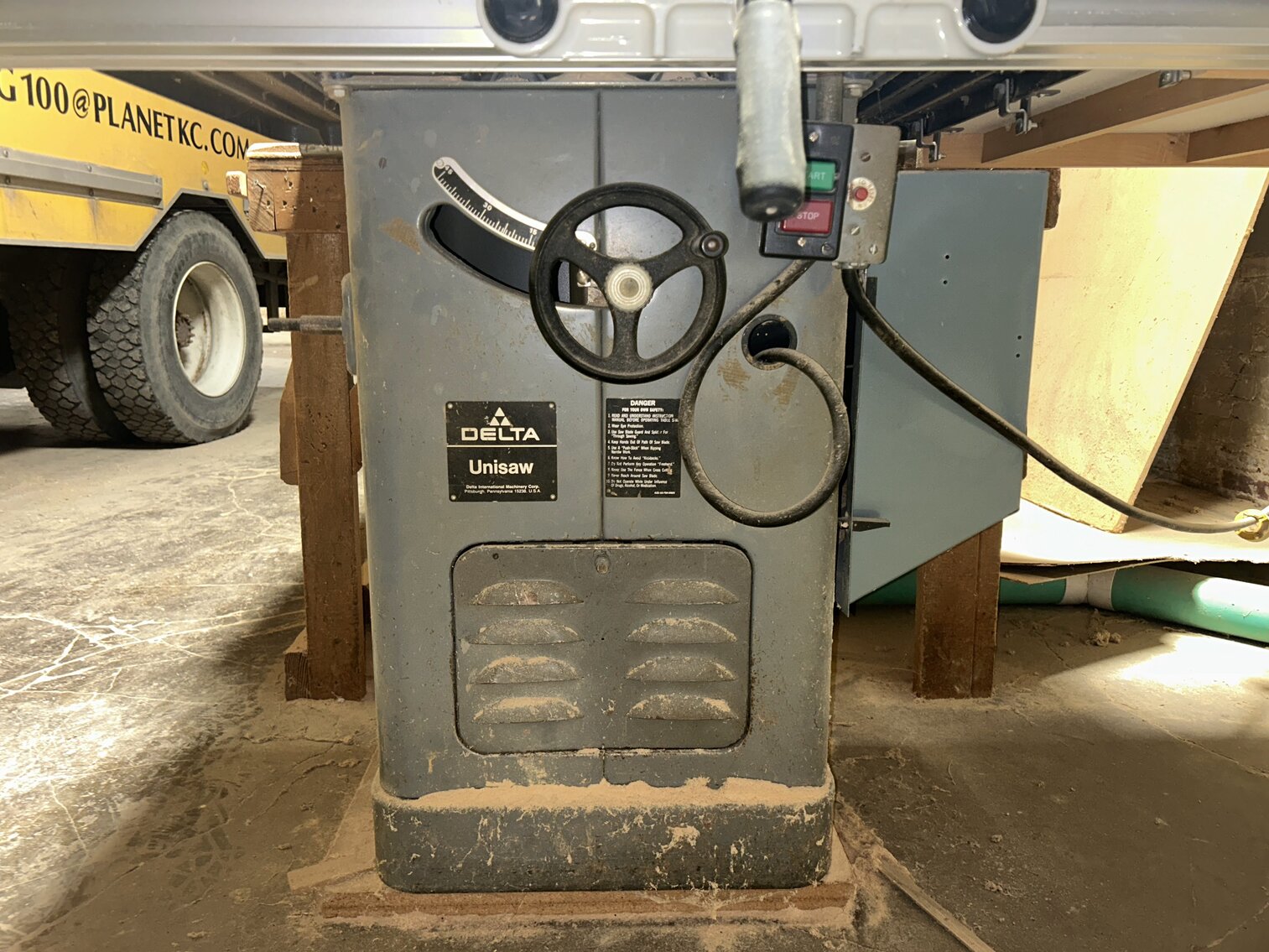 Delta Table Saw, with benches.  In middle building.