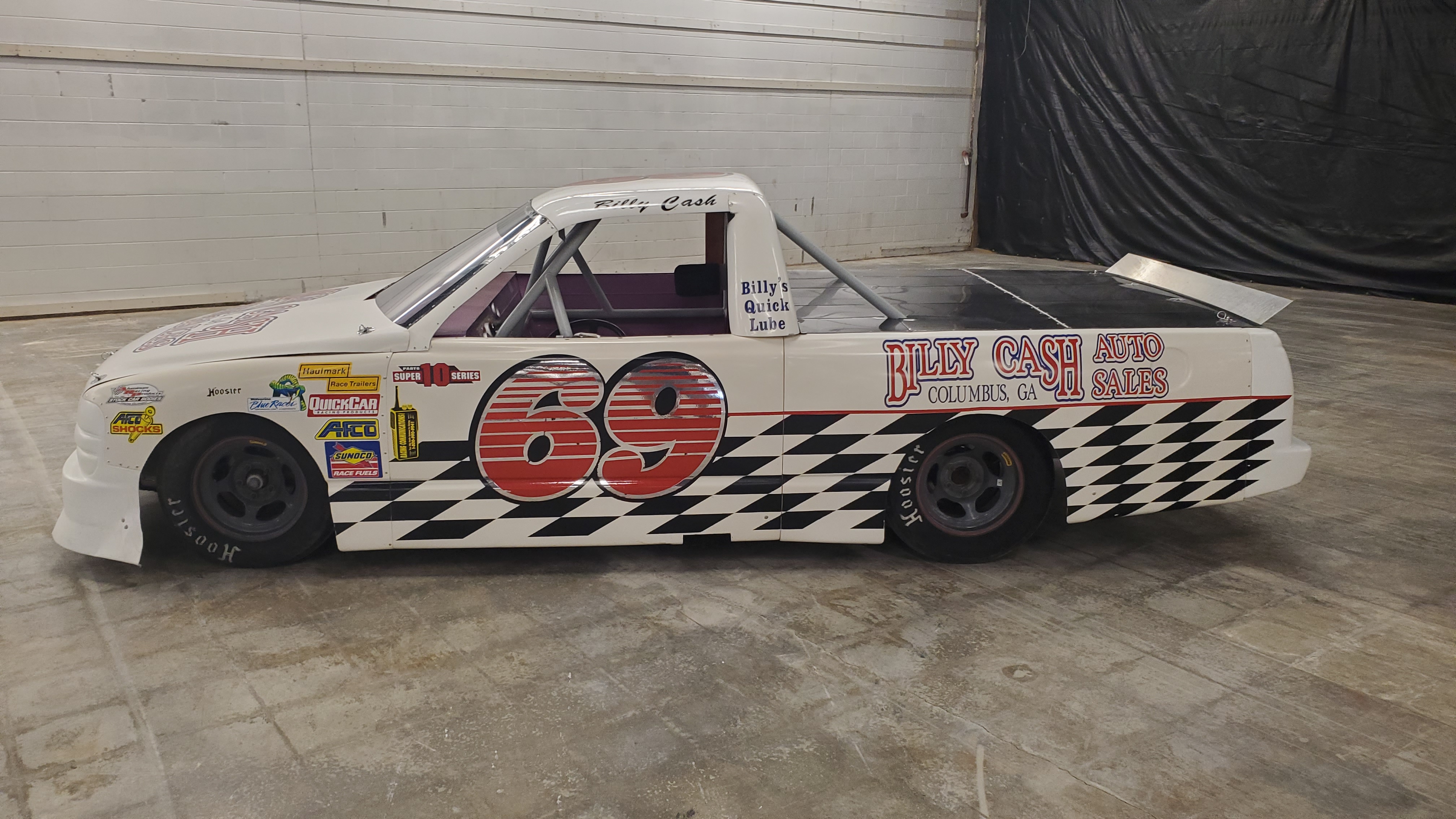 NASCAR-style race truck on a Pearson chassis with #69 Billy Cash Auto Sales livery