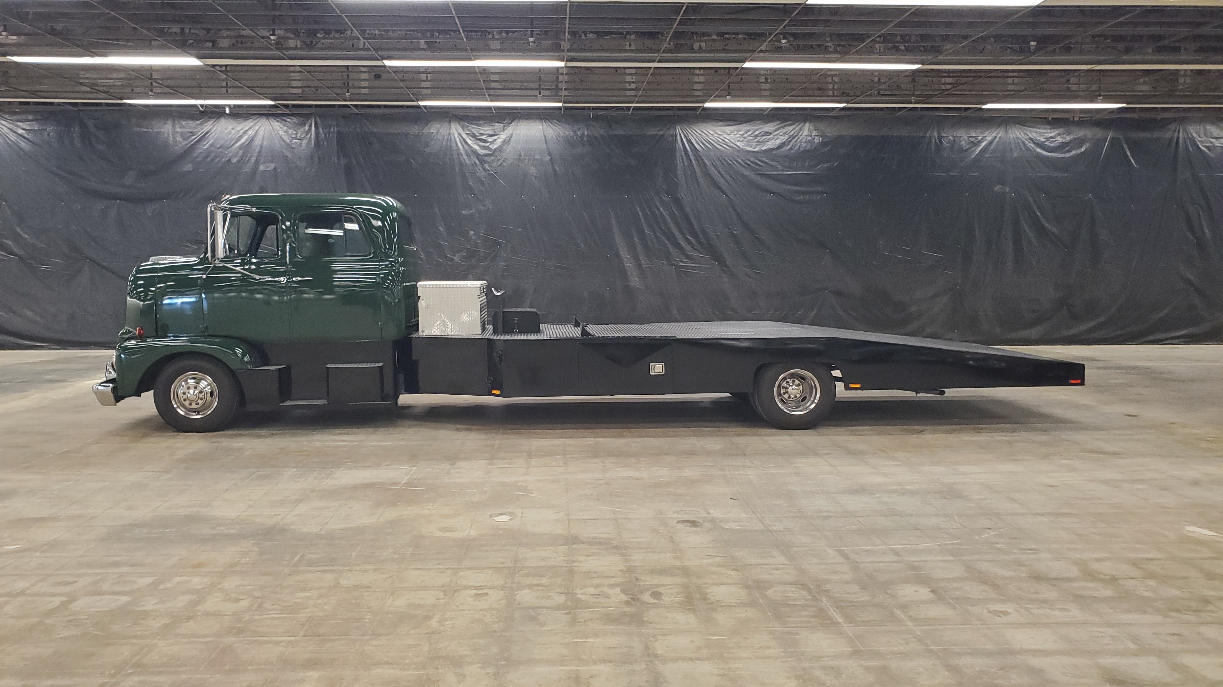 1952 International COE four-door car hauler finished in green