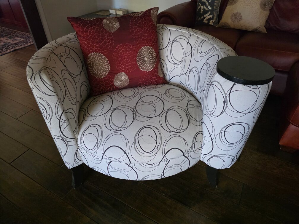 Barrel Chair With A Built-In Table Arm