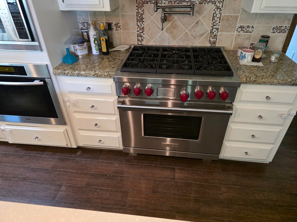CONTENTS OF THE DRAWERS (COOKING RANGE NOT FOR SALE)