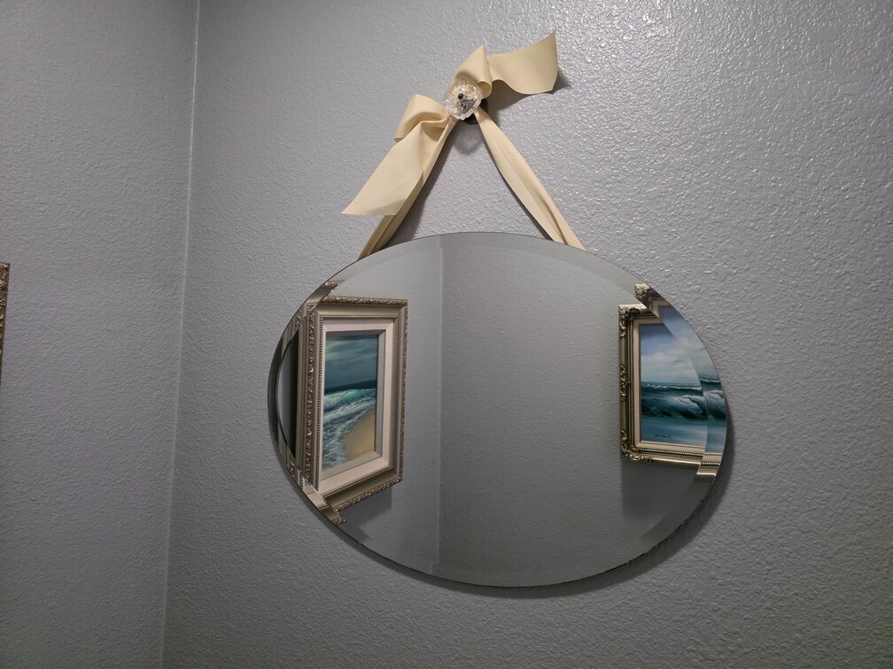 Hanging Oval-Shaped Mirror