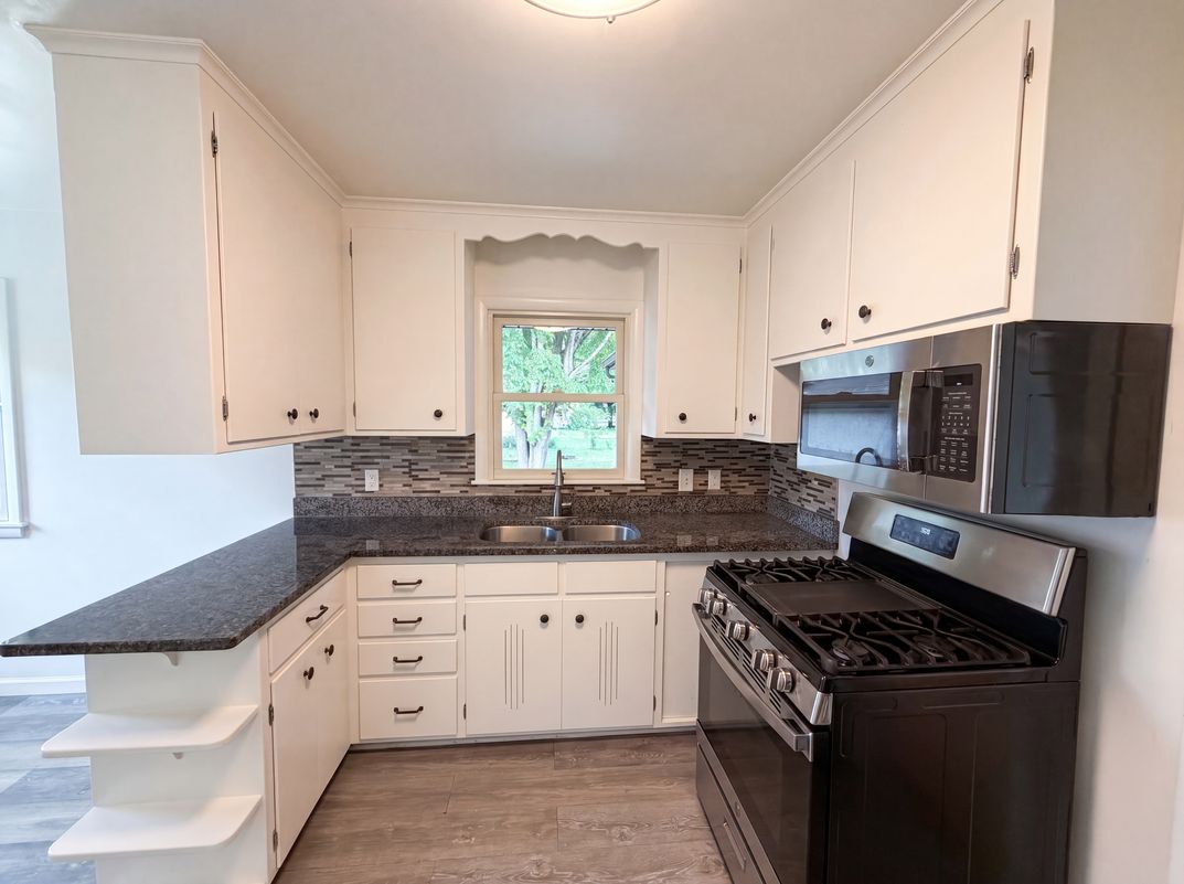 Photo 2 of 31 of 6180 6th St NE, Fridley, MN