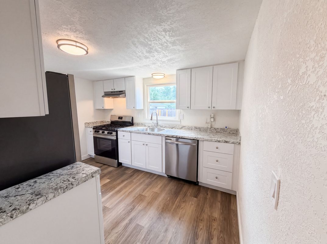 Photo 7 of 20 of 1298 S Perry St, Denver, CO