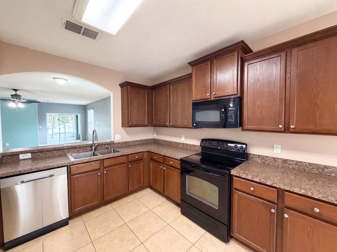 Photo 14 of 24 of 12902 Scout Ct, Grand Island, FL