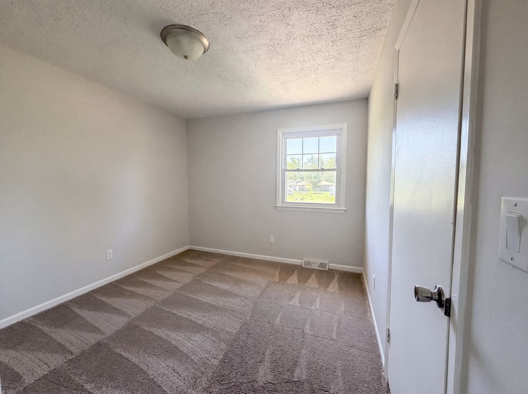 Photo 10 of 19 of 231 Downey Dr, Wellsville, KS