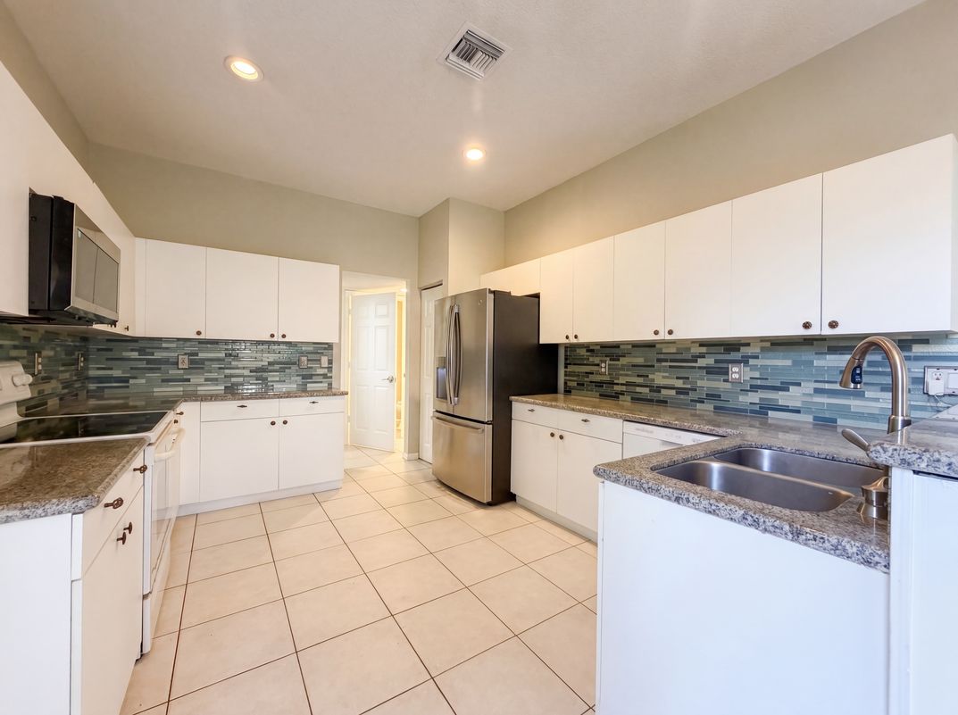 Photo 2 of 29 of 1848 Capeside Cir, Wellington, FL