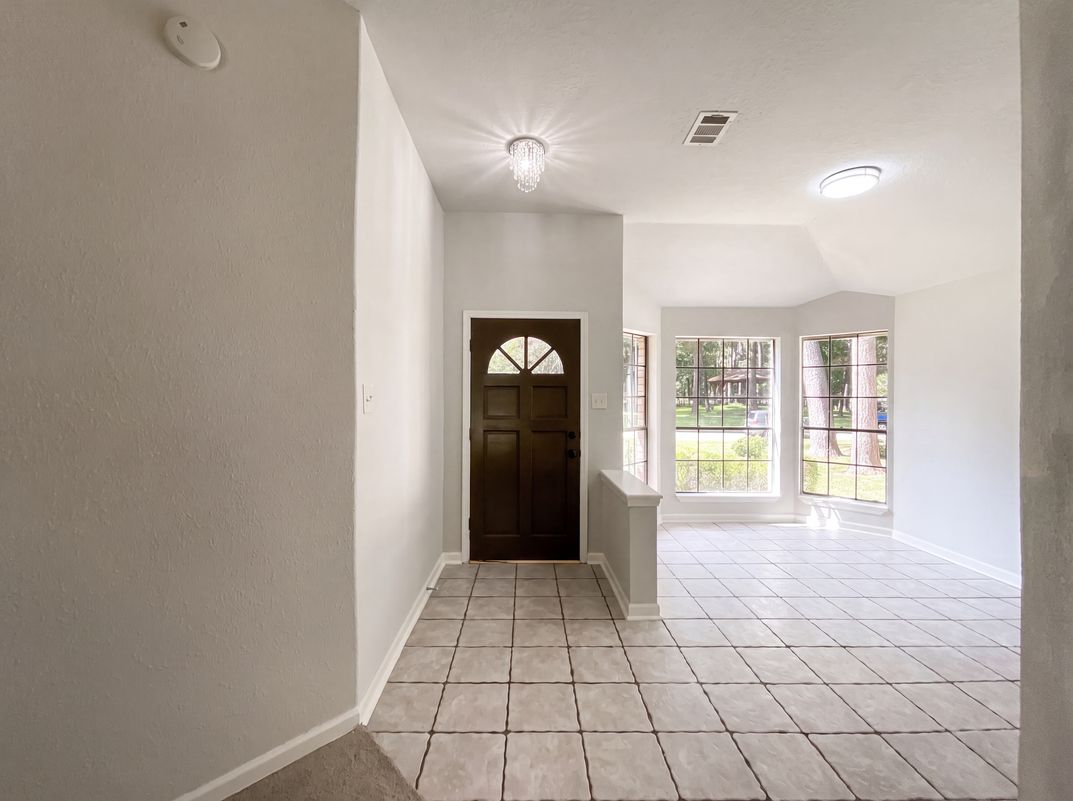 Photo 13 of 16 of 4911 Creek Shadows Dr, Kingwood, TX