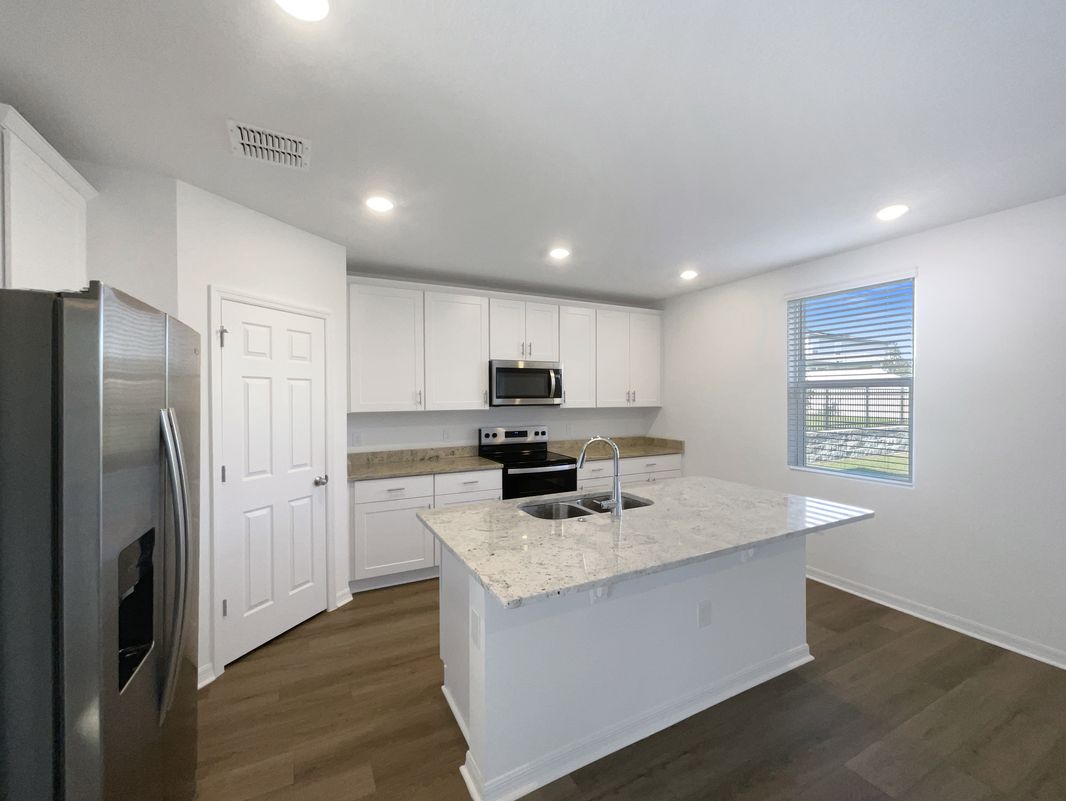 Photo 11 of 23 of 1128 Griffon Ave, Lake Alfred, FL