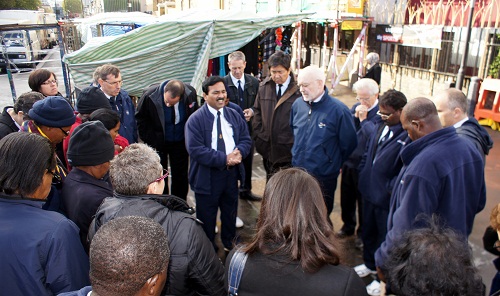 Sanjay leads in prayer at the Blind Beggar