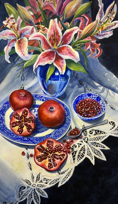 Still life with pomegranates and blue willow