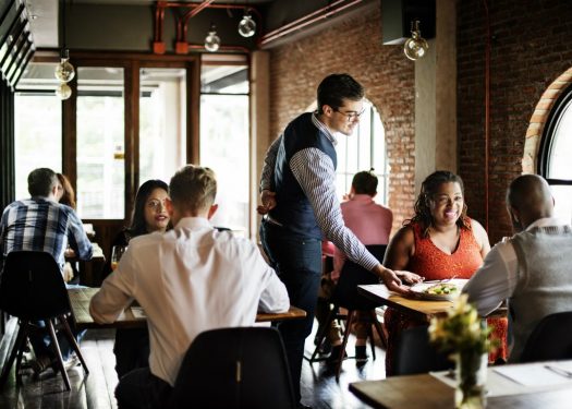 server delivering food to guest