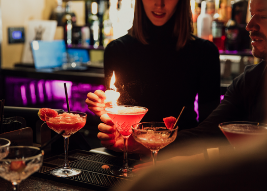 Barista making drinks that are current cocktail trends