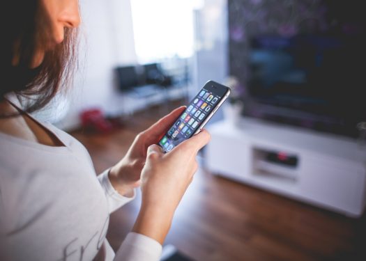 user on mobile device making a purchase, convert online engagement into sales