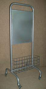 Stand with perforated plate and a plug-in basket