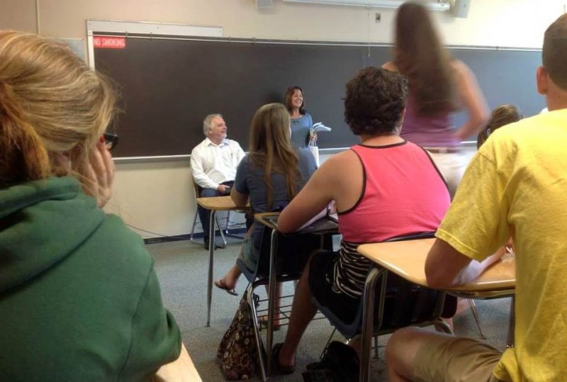 Kathy and Tony speaking to a class of students.