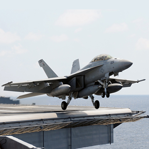 F14 Fighter Jet Carrier Launch Cover Art Blurred Background
