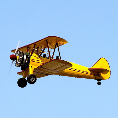 Propeller Biplane Pass By Cover Art Blurred Background