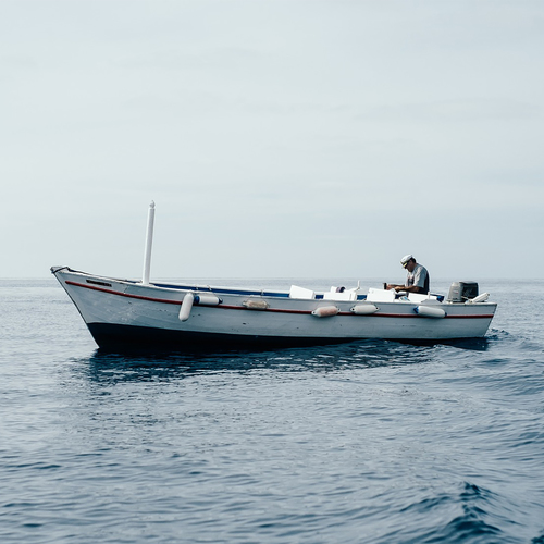 Outboard Motor Boat Pass By Cover Art Blurred Background