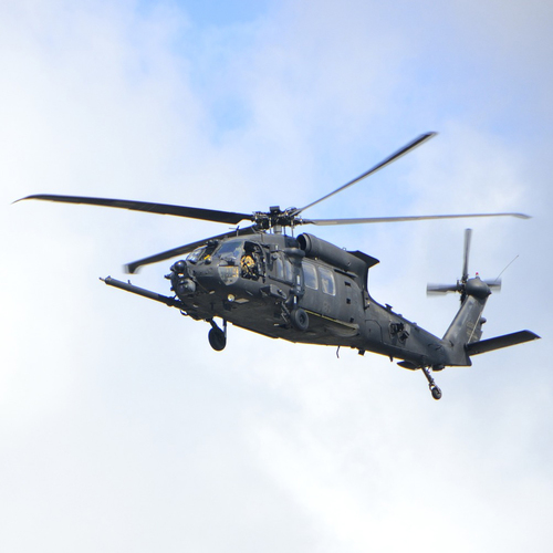 Army Helicopter Pass By Cover Art Blurred Background
