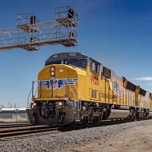 Freight Train Pass By with Bell Cover Art Blurred Background