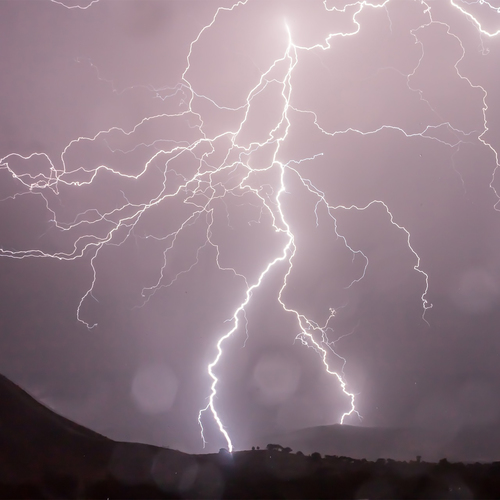 Thunder Booming Cover Art Blurred Background