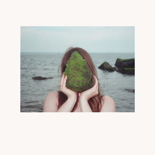 Hand in the Dark Cover Art Blurred Background