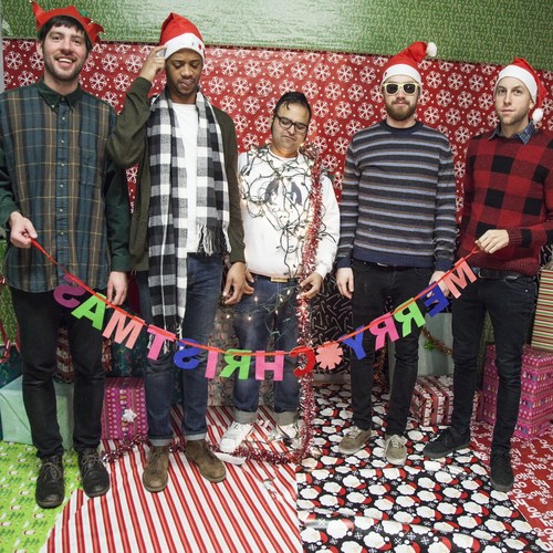 Rebuilder Christmas Cover Art Blurred Background