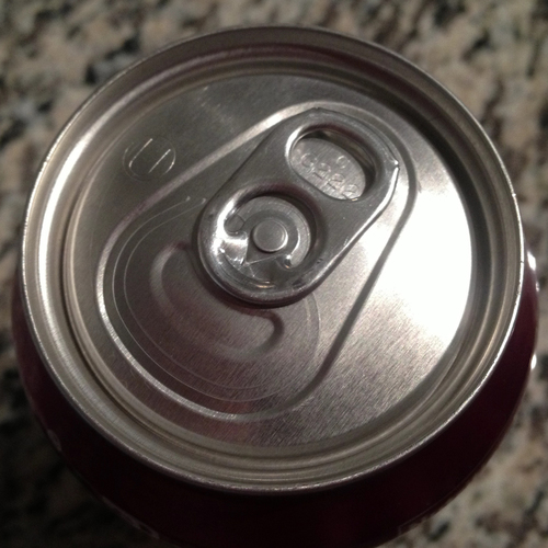Soda Can Opening Cover Art Blurred Background