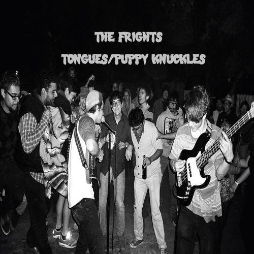 Tongues / Puppy Knuckles Cover Art Blurred Background