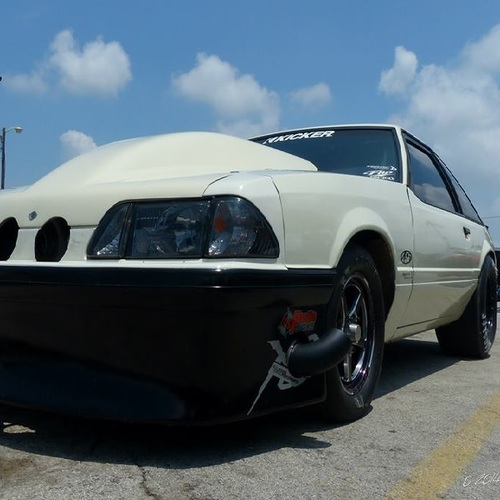 Death Trap Turbo Motor Pass (Version 2) Cover Art Blurred Background