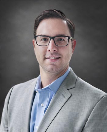 Headshot of John D. McDonald