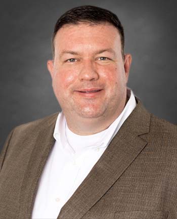 Headshot of David Riggs