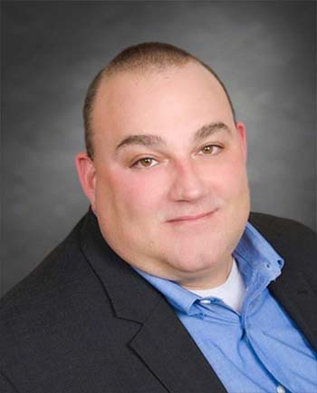 Headshot of Peter Orsita