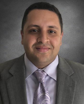 Headshot of Oscar Nunez Jr.