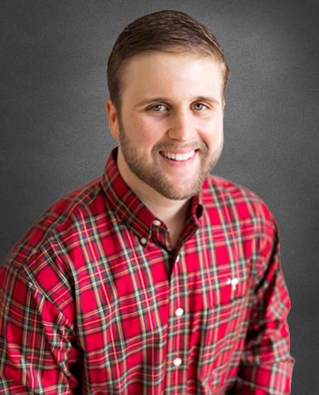 Headshot of John Simmons