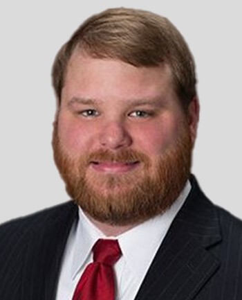 Headshot of Travis Blayton