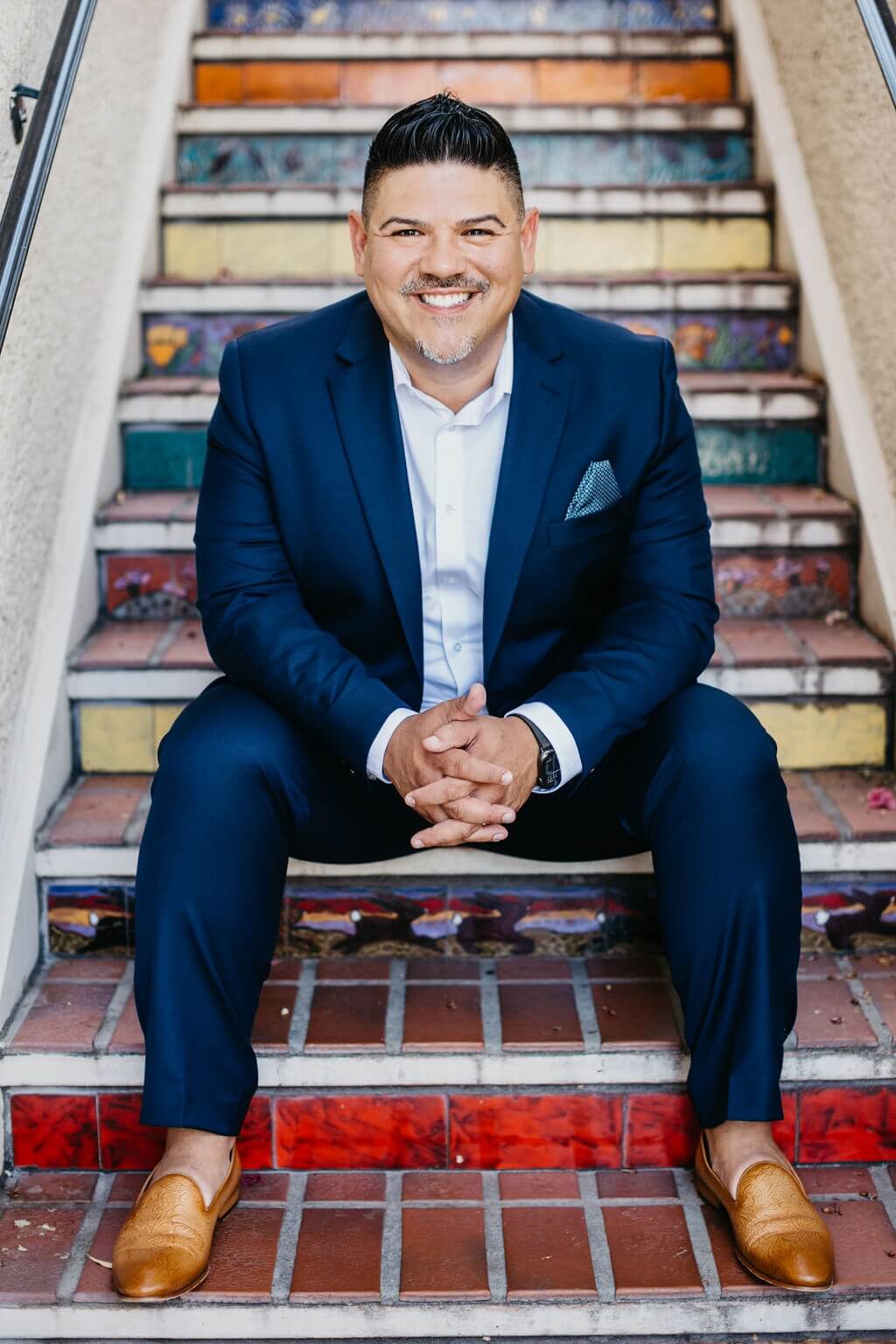 Headshot of John Kin-Bayze