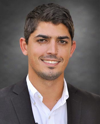 Headshot of John Ellis Haddad