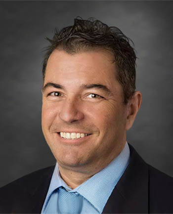 Headshot of John Dugan