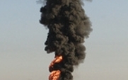 Aside_burning_oil_field