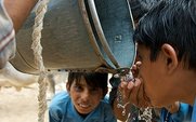 Aside_children_drink_water_largin