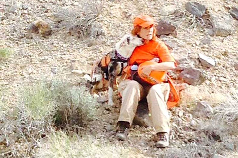 Catahoula leopard dog Piglet and her owner Lori Wells