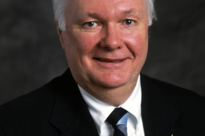 Dr. Thomas M. Davies, Chairman