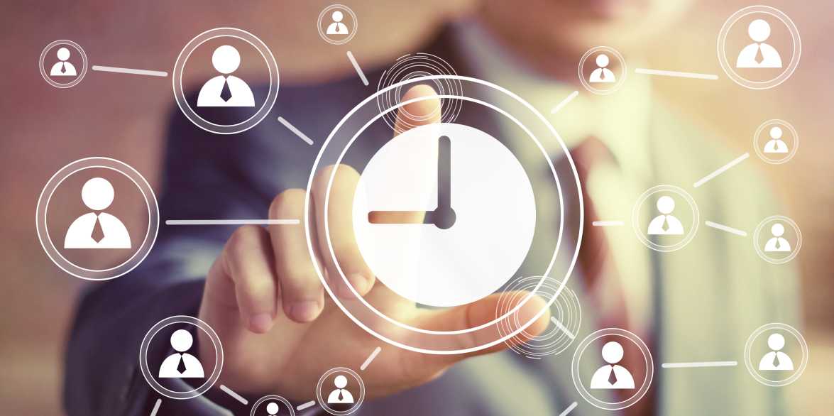 Businessman hand presses web clock time sign button