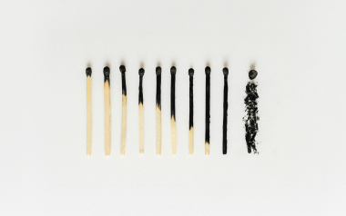 matches lined up, with each one more subsequently burnt