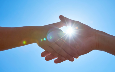 two people shaking hands