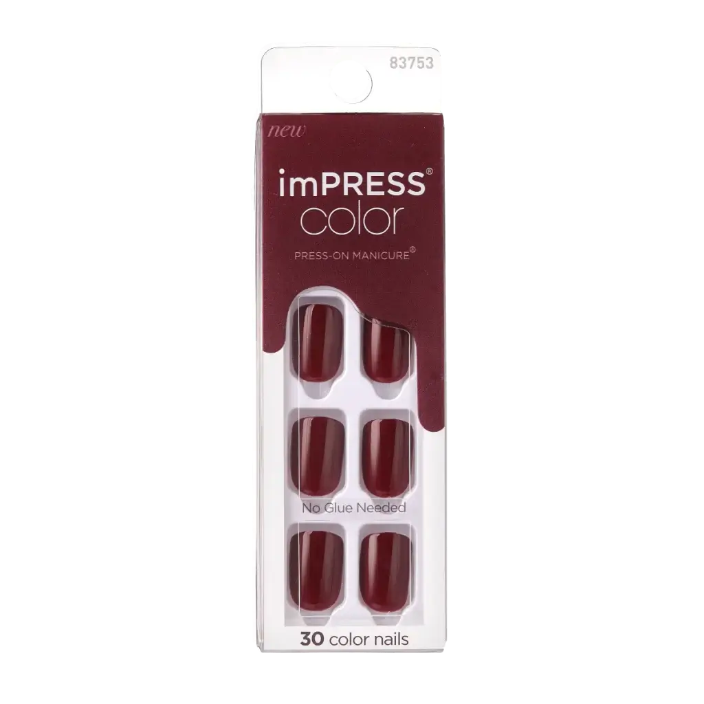 2023-09-25_d019b03f-a8f8-4a5a-80e1-dc3092a9aa53 | BEAUTIFY.TIPS A package of impress color press-on manicure nails in a deep red shade, labeled "no glue needed," containing 30 color nails.