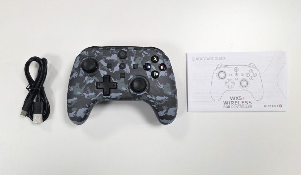 Gioteck WX5+ Wireless RGB controller with USB cable and manual