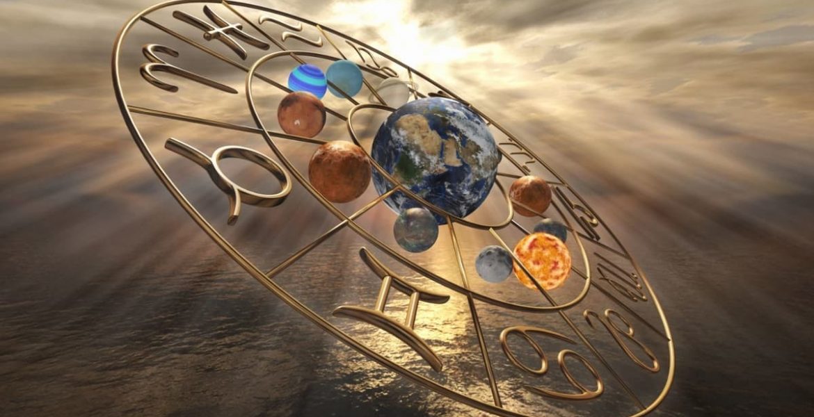 Rueda zodiacal dorada con planetas y la Tierra al centro iluminada por el sol, simbolizando los signos del zodiaco y la energía astrológica de la Luna Nueva en Libra 2025.